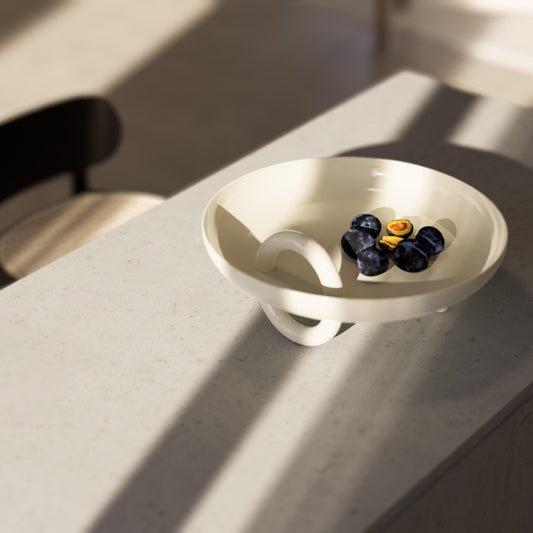 Atilio ceramic centerpiece placed on a living room table, adding a touch of elegant design - Mason Editions